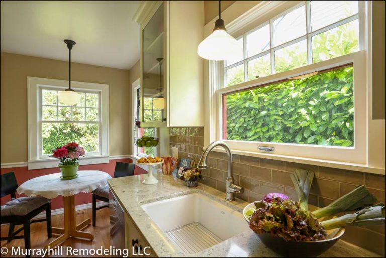 Kitchen remodel with pendant lighting and stone countertops in Tigard, OR